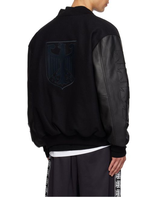 Vetements Black Logo Embroidered Bomber Jacket for men