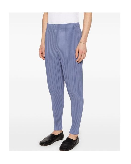 Homme Plissé Issey Miyake Blue Pleated Tapared Trousers for men