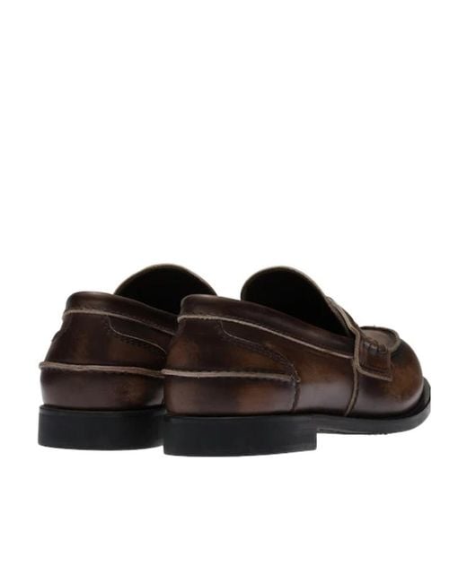 Miu Miu Brown Logo Embossed Slip-On Penny Loafers