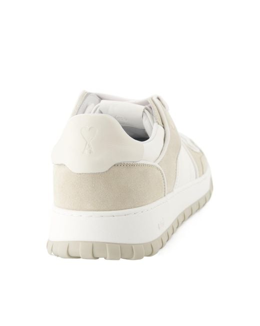 AMI White Ami Logo Embossed Low-Top Sneakers for men