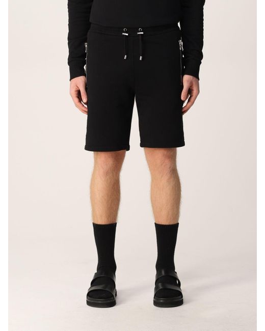 Balmain Black Logo Embossed Bermuda Shorts for men