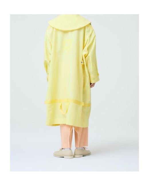 Homme Plissé Issey Miyake Yellow Carrier Carried Hooded Logo-Print Coat for men
