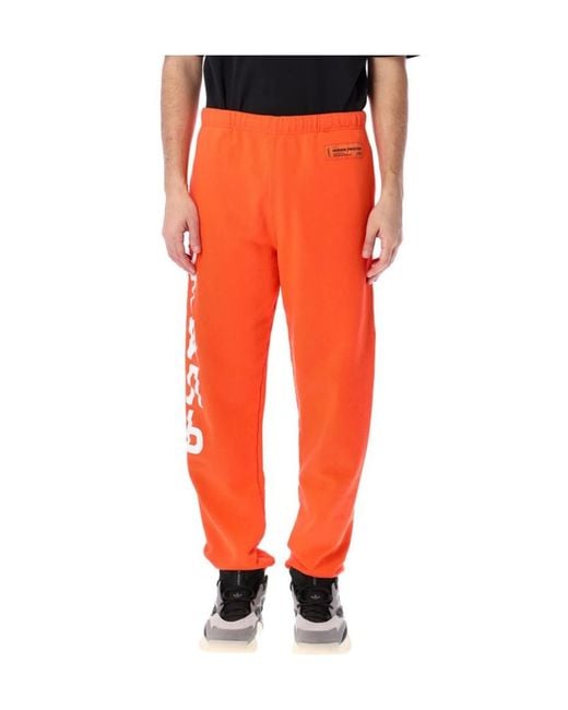 Heron Preston Orange Logo Print Elasticated-Waist Track Pants for men