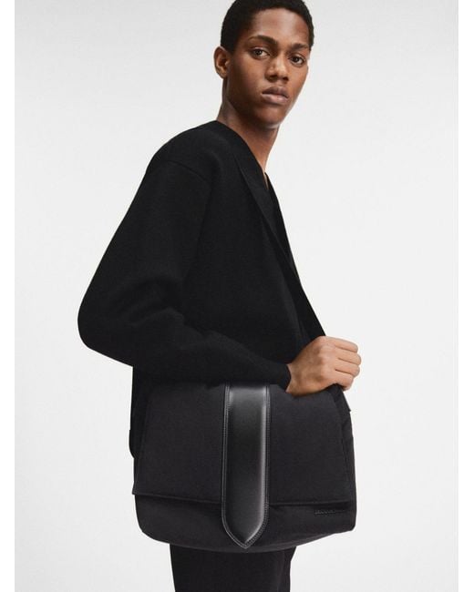 Jacquemus Black Logo Embossed Messenger Bag for men
