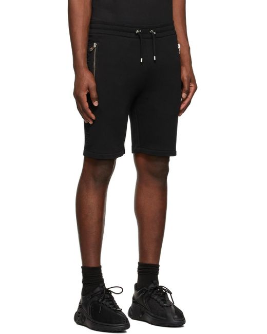 Balmain Black Logo Embossed Bermuda Shorts for men