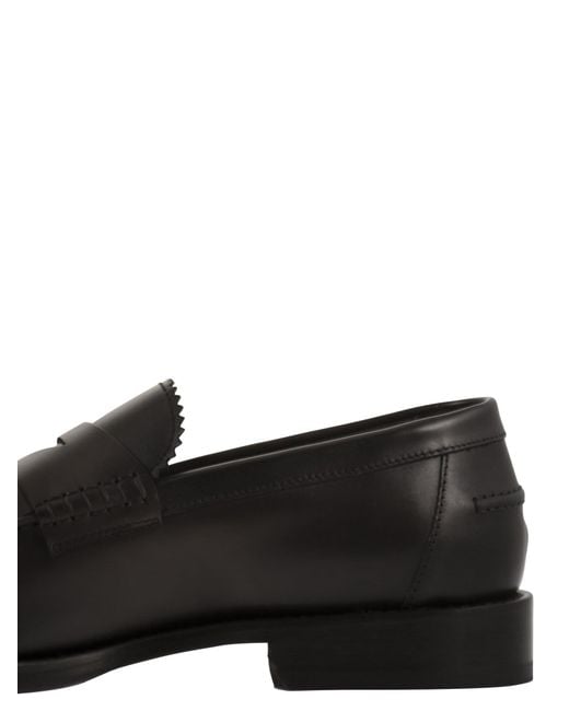 Doucal's Black Raised Stitch Moccasin Loafers for men