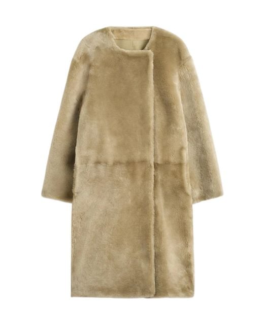 Totême Natural Collarless Shearling Coat Rye