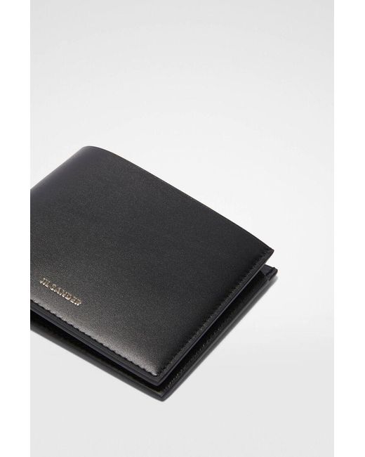 Jil Sander Black Logo-Embossed Tri-Fold Wallet for men