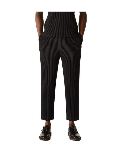 Homme Plissé Issey Miyake Black Homme Plissé Issey Miyake Pleated Tapered-Leg Pants for men