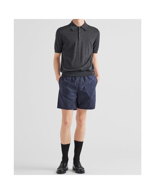 Prada Blue Triangle Logo Plaque Elastic Swim Shorts for men