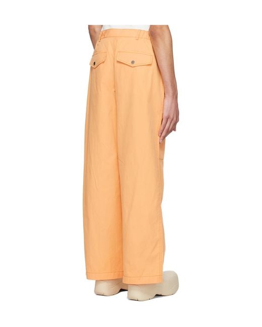 Dion Lee Orange Multi-Pocket Slouched Trousers for men