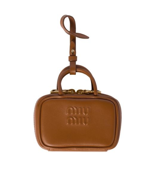 Miu Miu Logo-Embossed Trick Keychain in Brown | Lyst