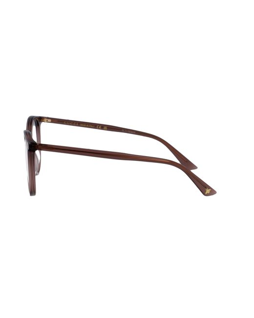 Gucci Metallic Eyewear Round Frame Glasses