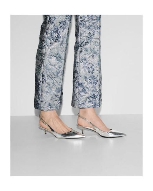 Gucci White Metallic Signoria Slingback Pumps