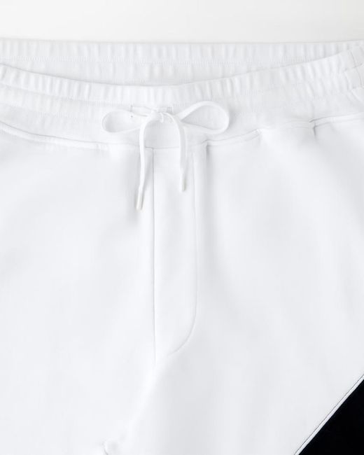 Versace Blue Logo-Embroidered Panelled Track Pants for men