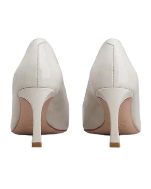 Roger Vivier White Trompette Buckle Pumps