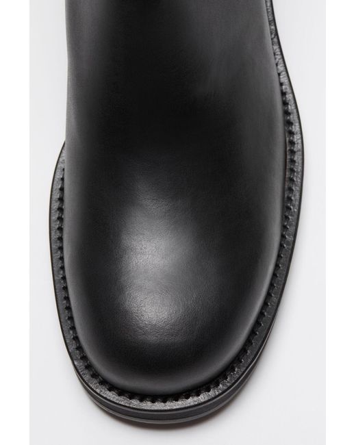 Acne Black Leather Waxed Boots for men