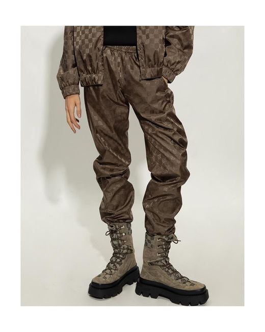 M I S B H V Brown Monogram Printed Tapered-Leg Trackpants for men