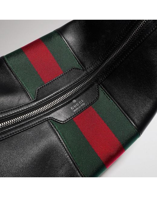 Gucci Black Mega Web Trademark Medium Crossbody Bag for men