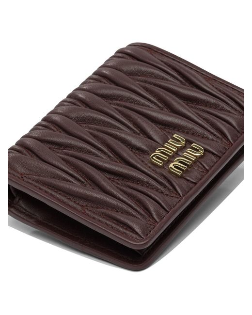 Miu Miu Purple Logo-Lettering Matelassé Bi-Fold Wallet