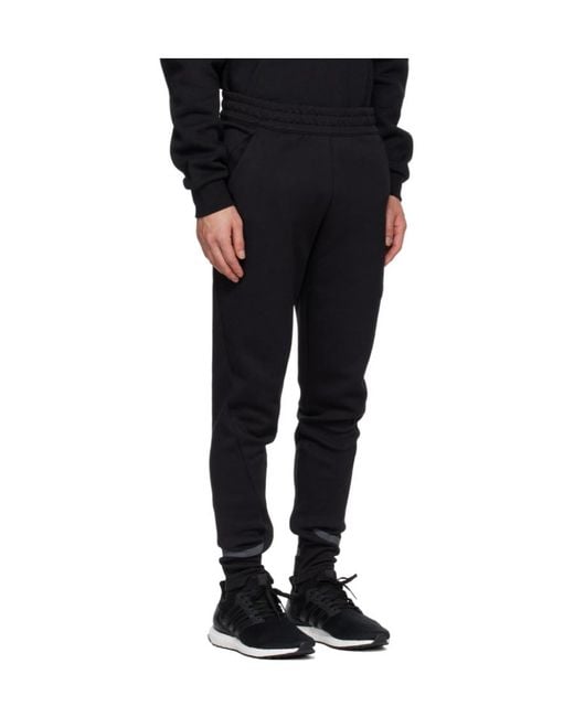 Adidas Originals Black Adidas Gameday Logo Patch Track Pants for men