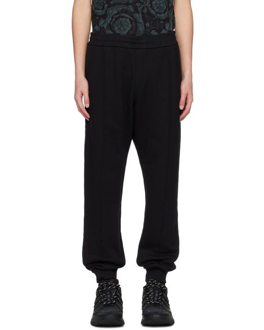 Versace Black Logo-Embroidered Elasticated Waistband Track Pants for men