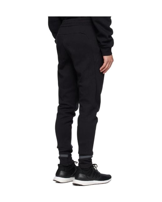 Adidas Originals Black Adidas Gameday Logo Patch Track Pants for men