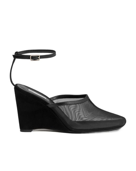 AMI Black Crosiette Mules