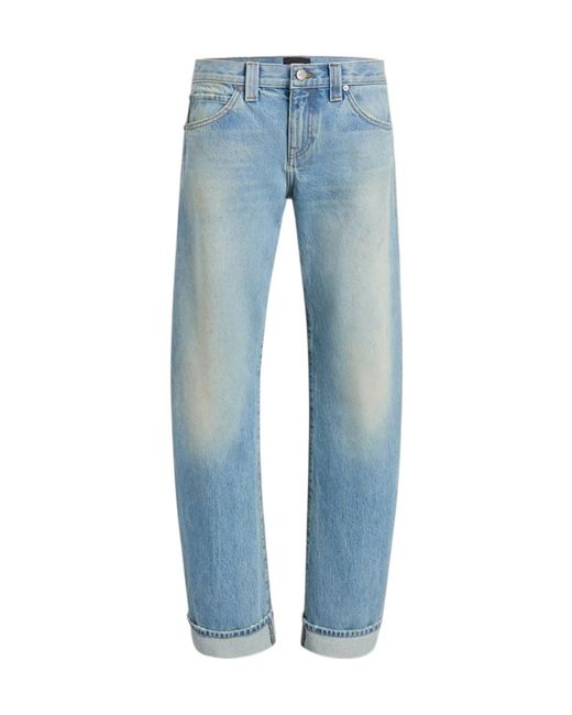 Khaite Blue Karo Low-Rise Curved Leg Jeans