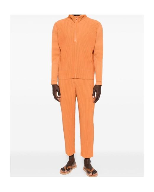 Homme Plissé Issey Miyake Orange March Pleated Trousers for men