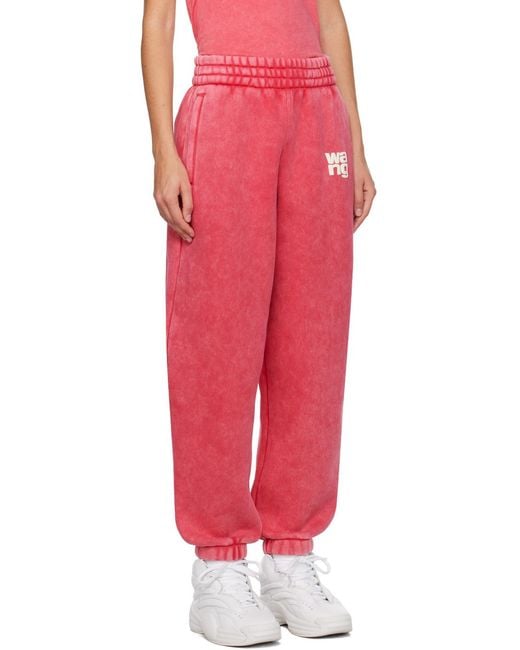 Alexander Wang Red Rubberised-Logo Cotton-Blend Track Pants