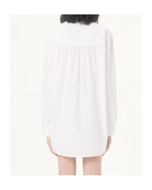Valentino White Curved Hem Long-Sleeved Top