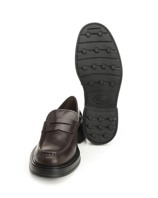 Tod's Black Almond Toe Penny Loafers for men
