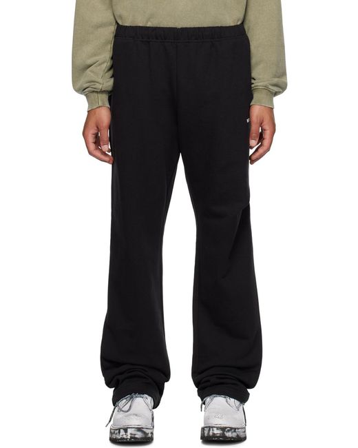 we11done Black Logo-Print Track Pants for men