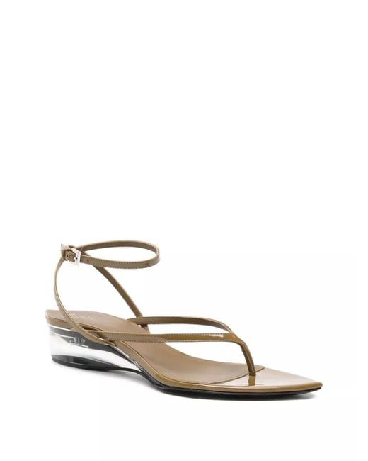Alaïa White V-Strap Flat Sandals