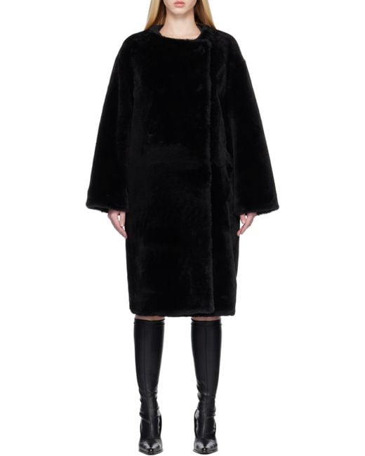Totême  Black Collarless Shearling Coat