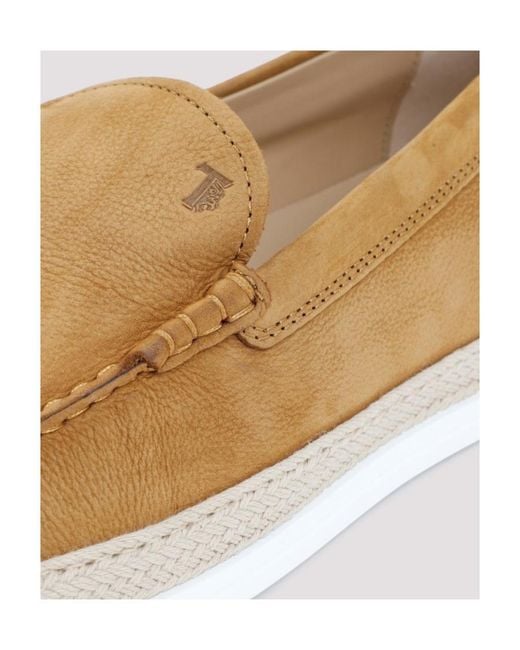 Tod's White Logo Embossed Slip-On Loafers for men