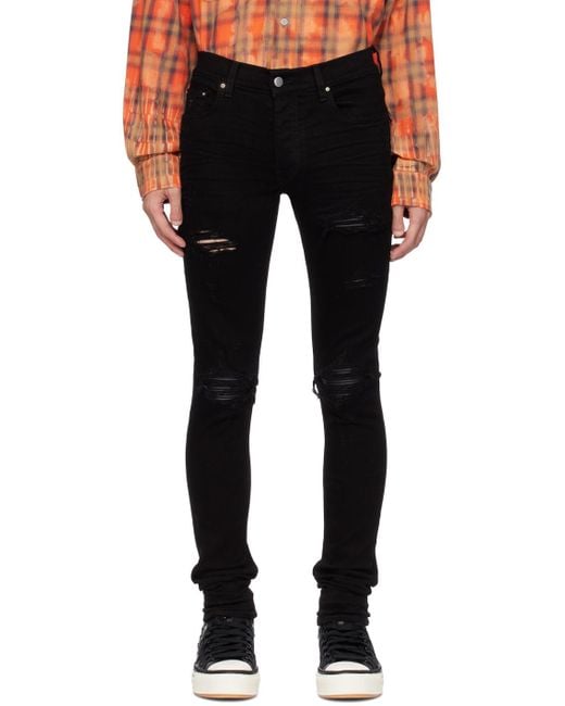 Amiri Black Mx1 Distressed Tapered Leg Jeans for men