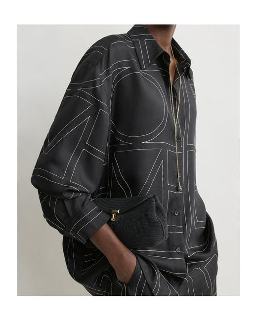 Totême Black Monogram-Embroidered Silk Shirt