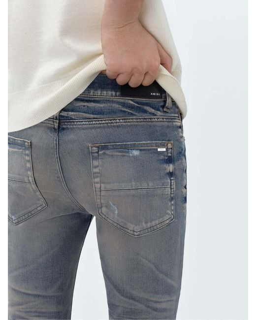 Amiri Blue Belt-Strap Jeans for men