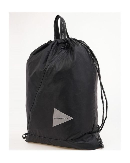 And Wander Black Drawstring Tote Bag for men