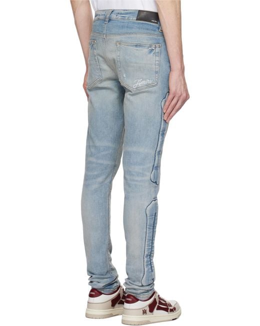 Amiri Blue Bone Detailed Skinny Jeans for men