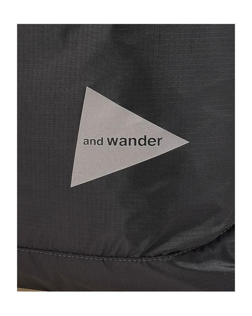 And Wander Black Drawstring Tote Bag for men
