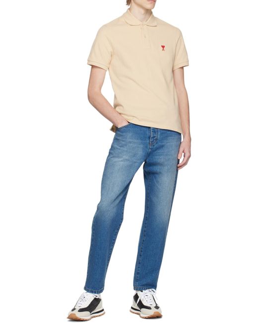 AMI Blue Logo Patch Tapered-Leg Jeans for men