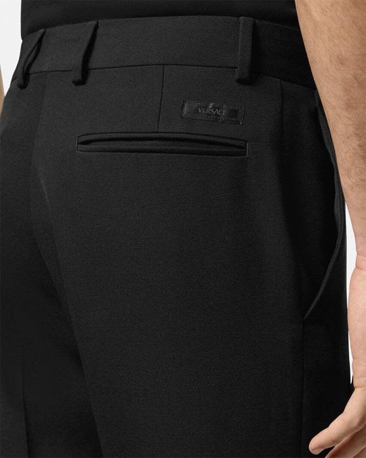Versace Black Logo-Appliqué Tailored Trousers for men