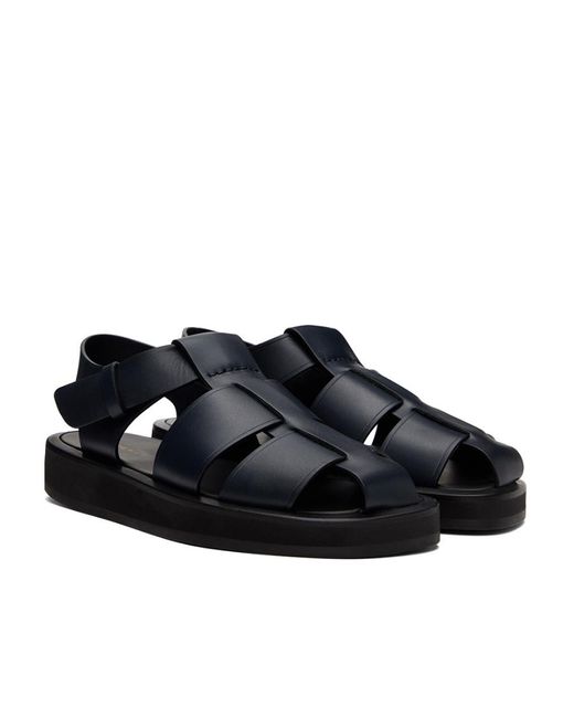 The Row Black Logo Flat Sandals