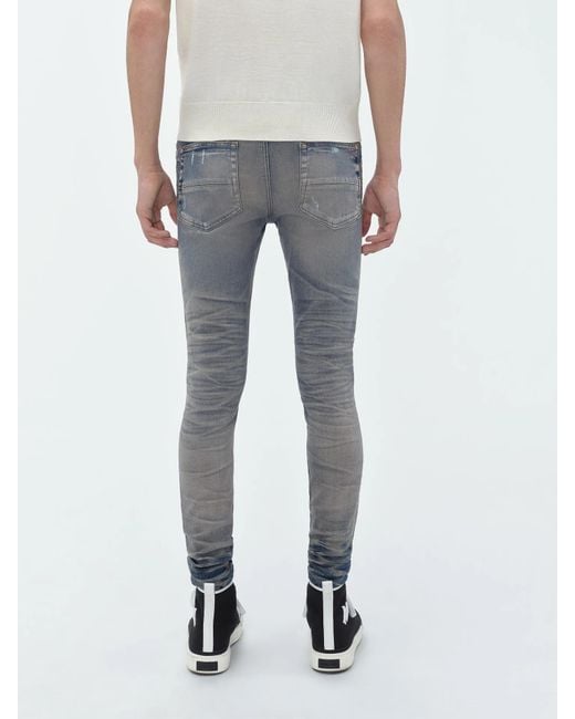 Amiri Blue Belt-Strap Jeans for men