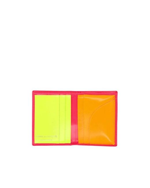 Comme des Garçons Pink Bi-Fold Card Holder for men