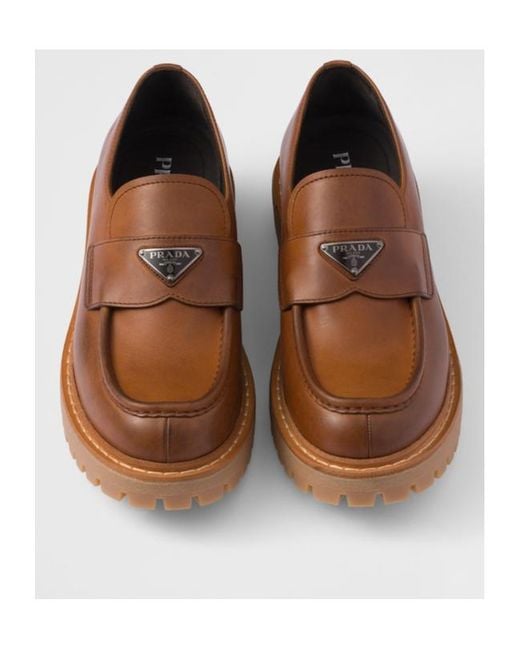 Prada Brown Logo Plaque Round Toe Loafers for men