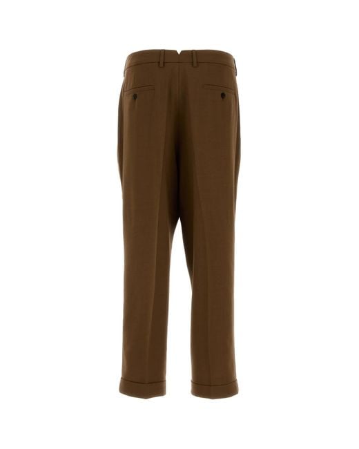 AMI Brown Tailored Carrot Fit Trousers for men